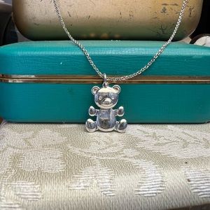Charles Garnier, Sterling, silver teddy bear pendant with diamond eyes and chain
